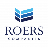 Logo for Roers Companies featuring a blue, three-tiered chevron icon above the company name.